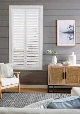 Modern white plantation shutters for windows.