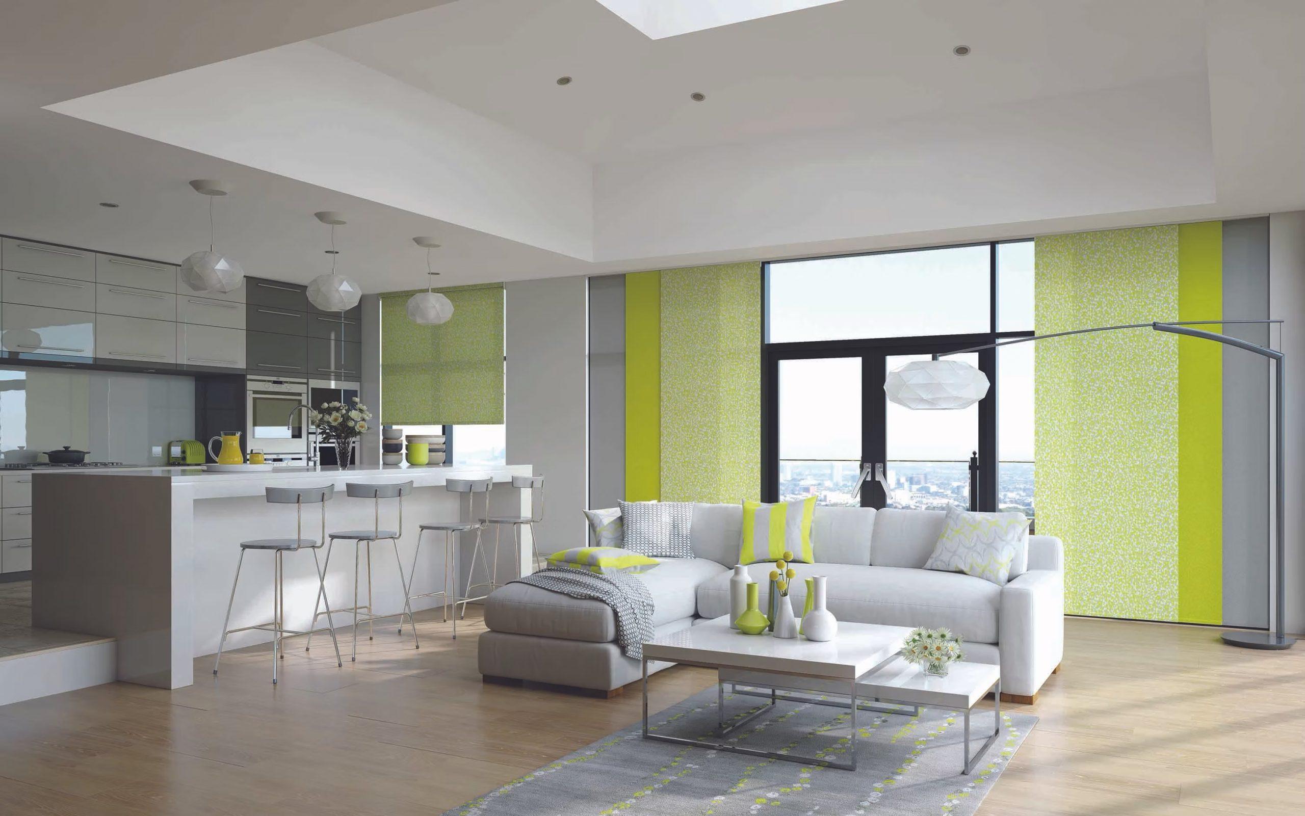 Modern living room with Sovereign shading systems and large windows.