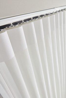 Modern white vertical blinds for windows, ideal for shading and privacy solutions.