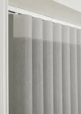 Modern vertical blinds for shading and privacy in residential and commercial spaces.