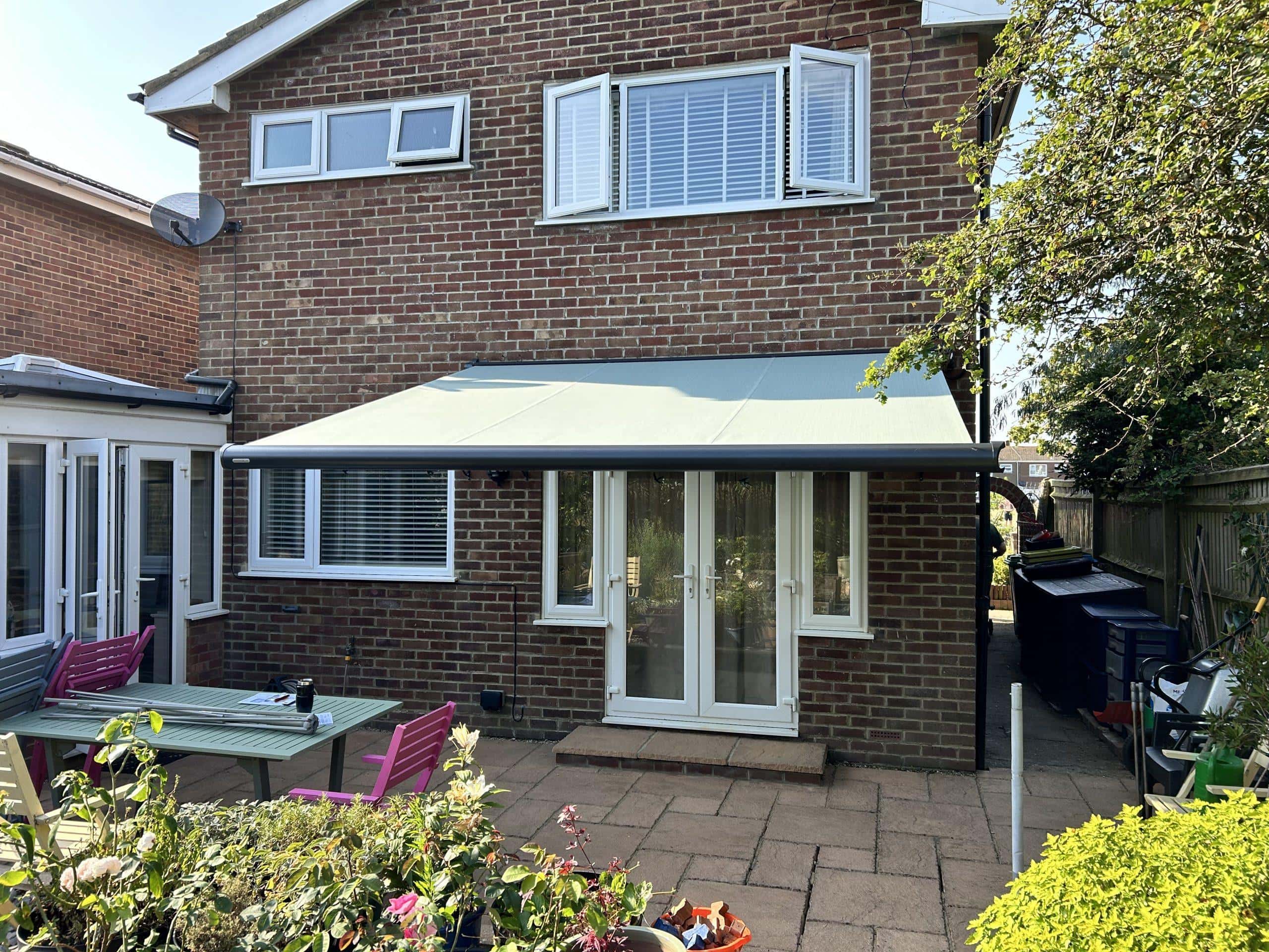 Durable retractable patio awning by Sovereign Shading Systems for outdoor comfort and sun protection.