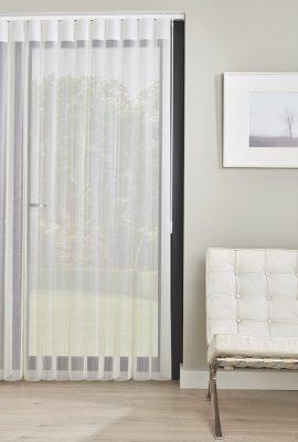 Elegant sheer curtain with blackout roller blind.