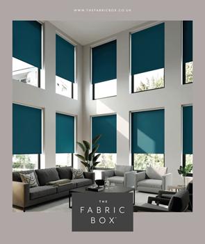 Modern interior with fabric box window blinds in a bright living room.
