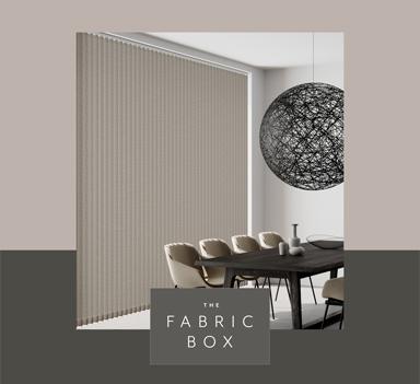 Modern fabric box blinds by Sovereign Shading Systems in a contemporary dining room setting.