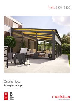 Modern outdoor patio cover with glass walls and yellow roof panels by Sovereign Shading Systems.