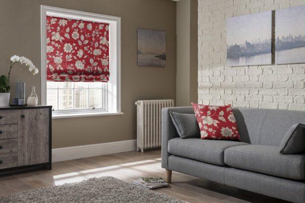 Elegant red floral roller blind for stylish window shading solutions.