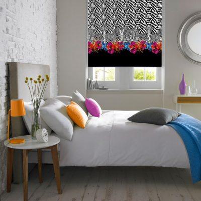 Modern zebra and floral patterned window blinds in a contemporary bedroom.