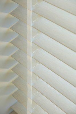 High-quality wooden window blinds for shading and privacy.